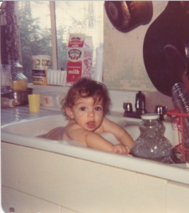 Baby Joshua, bathing in the San Francisco commune sink.