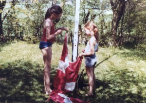 Lea as a kid (right) with her cousin, getting ready to raise the Danish flag