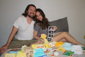 Jared and Sharry with their ultrasound photos